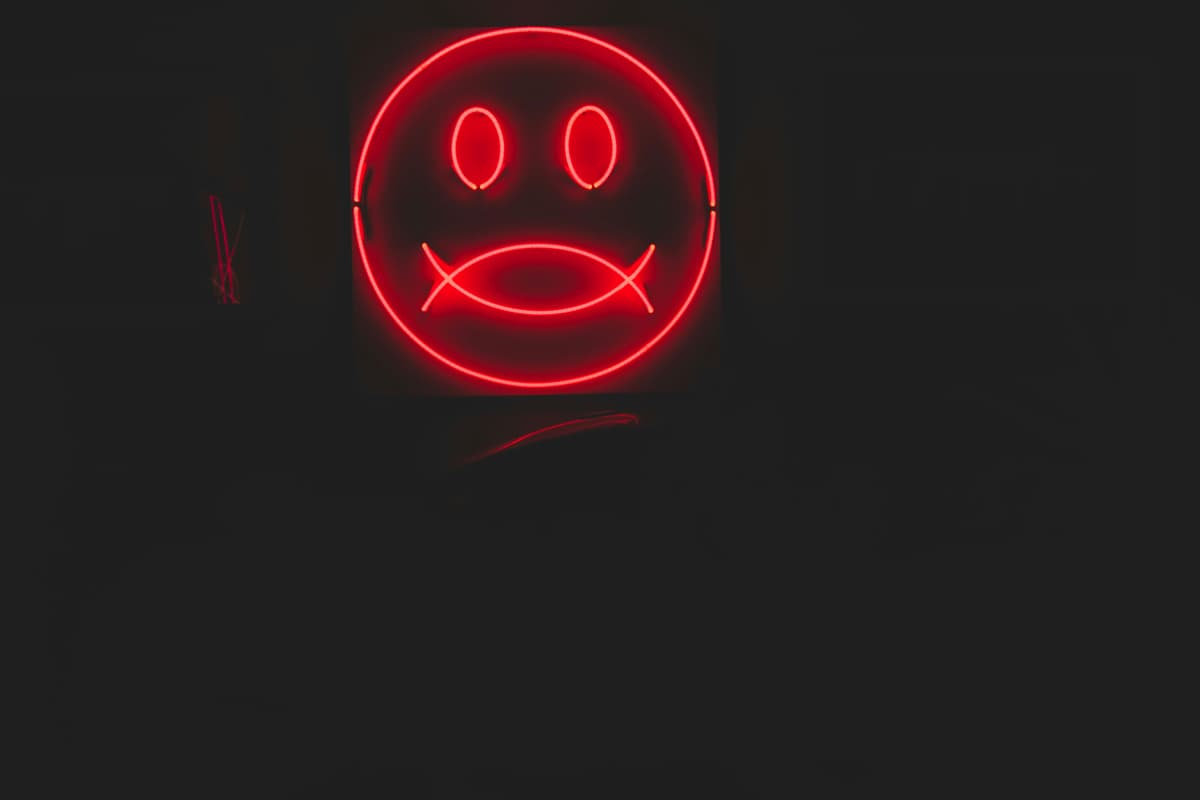 Smile but also frown